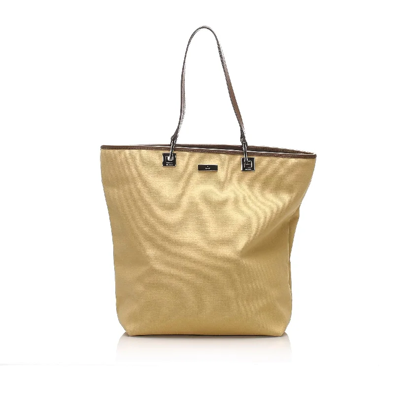 Best bags for business trips  Gucci GG Canvas Tote Bag (SHG-13307)