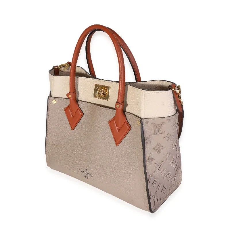 Luxury brand bags on sale  Louis Vuitton Galet Calfskin & Tufted Monogram On My Side MM Tote