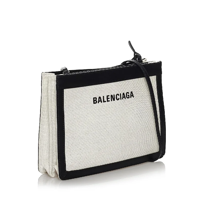 Best bags for business trips  Balenciaga Navy Pochette S Canvas Crossbody Bag (SHG-29713)
